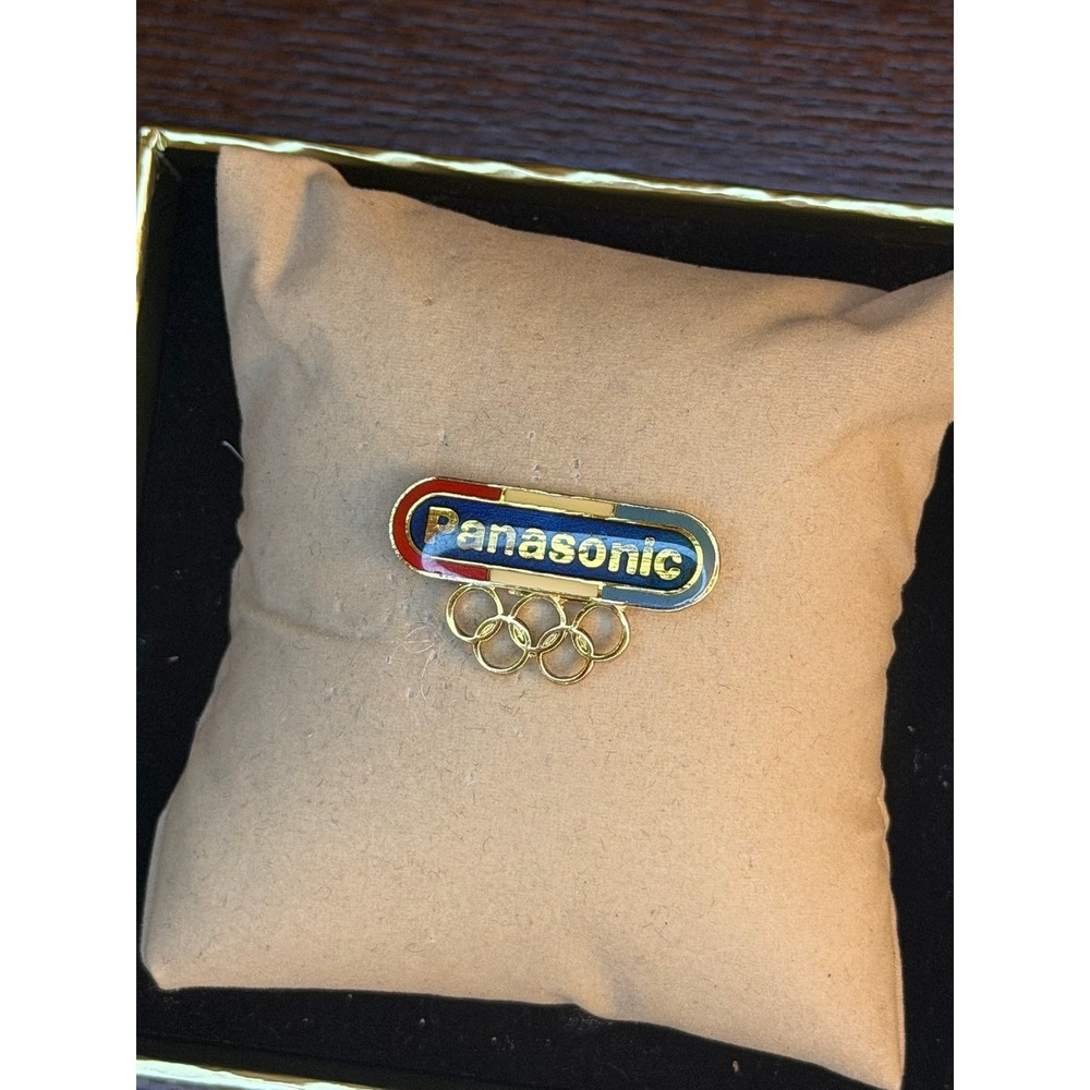Panasonic Olympic Games Sponsor Lapel Pin Gold Tone Enamel Five Rings Logo